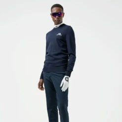 J.Lindeberg Gus Golf Sweater -Golf Apparel Store J.Lindeberg SS22 Gus Golf Sweater GMKW05753 6855 Code SWLIN060 M JL Navy White Model 1