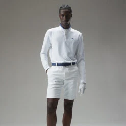 J.Lindeberg Tyson Long Sleeve Golf Polo Shirt -Golf Apparel Store J.Lindeberg Tyson LS Reg Fit Polo GMJT07801 0000 SHLIN154 WhiteNavy Peony Model 1